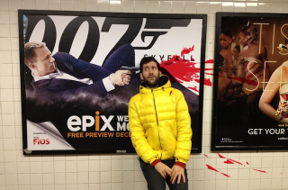 Illustration for article titled Man pretends to be shot by violent movie posters